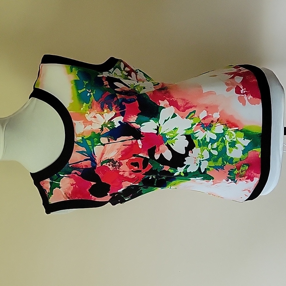 Polyester floral sleeveless top, back zip.
